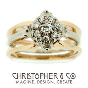 CMJ S 13190    Gold ring set with diamonds designed by Christopher M. Jupp.