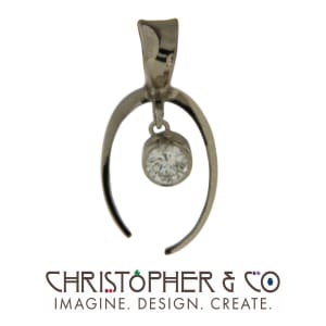 CMJ T 21051   White gold pendant designed by Christopher M. Jupp set with diamond.