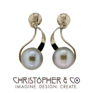 CMJ T 21053    White Gold earring pair set with pearls designed by Christopher M. Jupp.