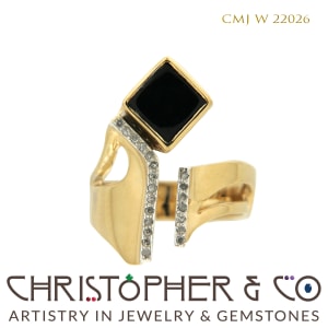 CMJ W 22026  Yellow gold ring designed by Christopher M. Jupp set with onyx and diamonds.