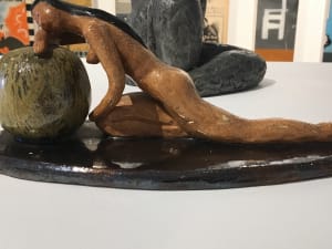 Woman Leaning on the World