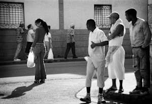 Untitled (Men Looking at Woman)