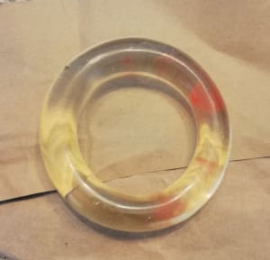 Clear, red donut bangle with diamonds
