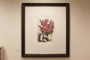 Untitled (Couple embracing below flowers)