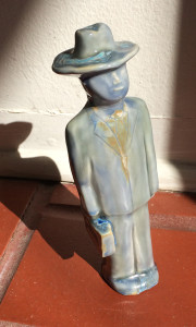 The Man, with turquoise hat