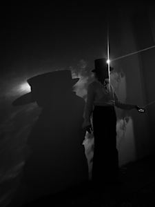 “Ephemeris” Interactive light installation, made with black plastic and pinholes and window.  Orquevaux, France 2024