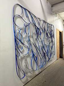 blue paisley wall hanging or room divider