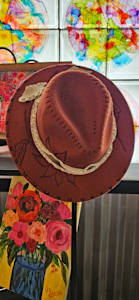 Rust hat with sunflower