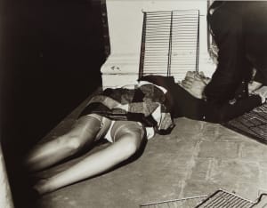 Title unknown. (girl passed out on floor)
