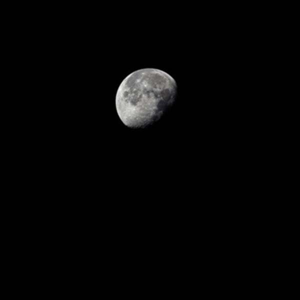 Dead Military Navigation Satellite (Cosmos 985) Near the Disk of the Moon by Trevor Paglen, Image 1.