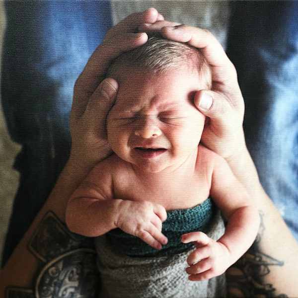 Cradled by Dad by Eliza Nolte , Image 1.