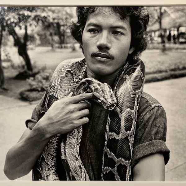 Man with Snake, Bangkok by Stephen Perloff, Image 1.