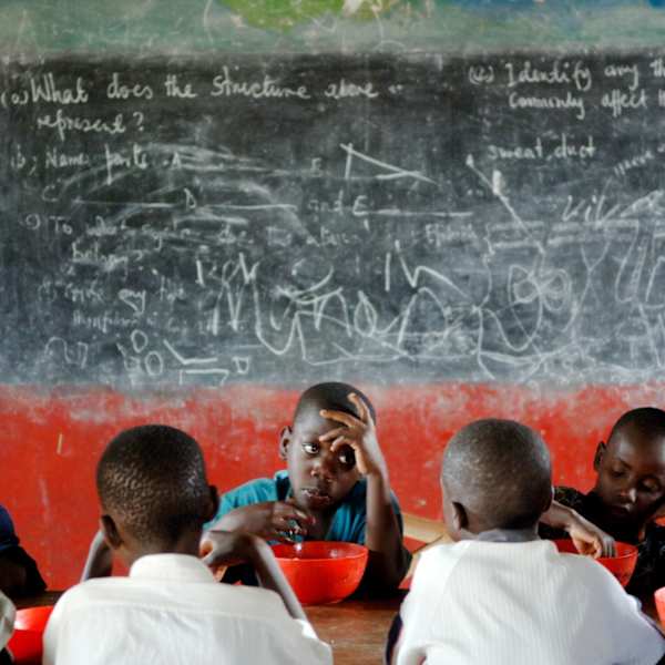 Silent Lunch, Kiwanga Home Uganda by Doug Menuez, Image 1.