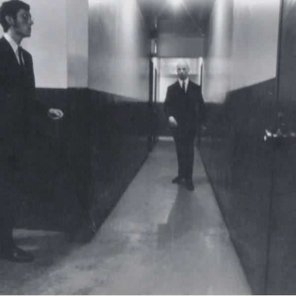 Untitled (men in hall), c. 1975 by Duaine Michals, Image 1.