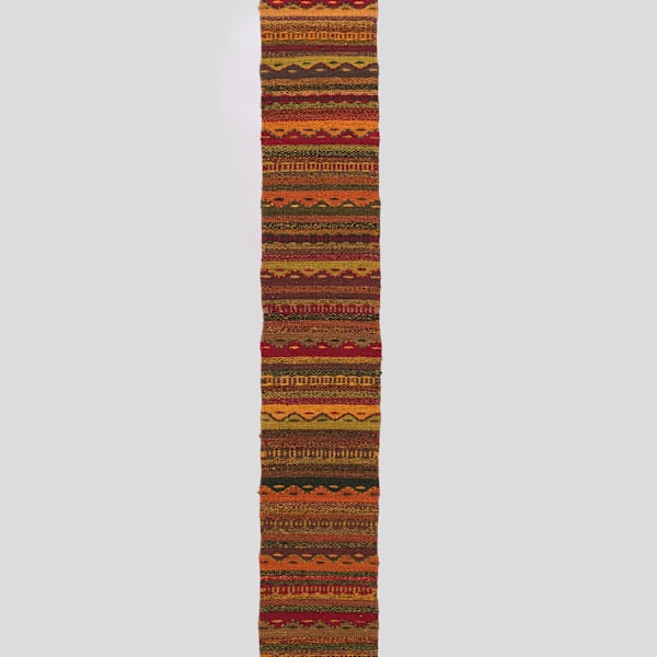 Mountains and Tears Woven Table Runner by Dolores Santiago, Image 1.
