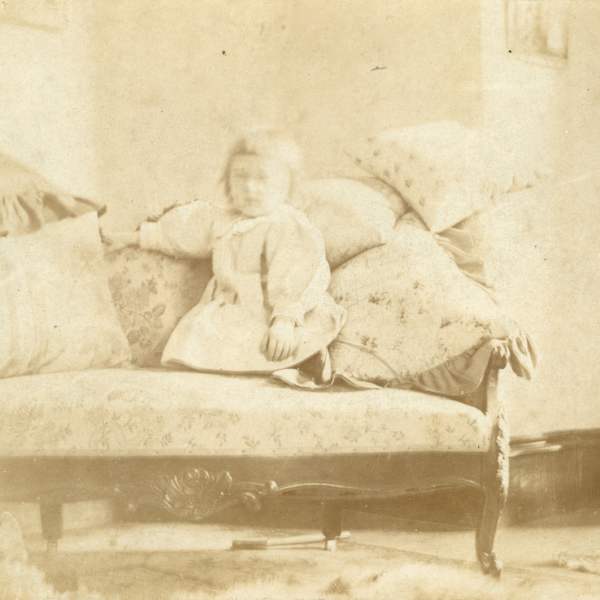 Child in Parlor with Hammer by [Unknown] Brown, Image 1.