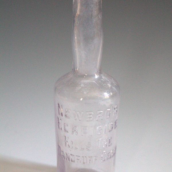Bottle by DuPont M. Newbro, Image 1.