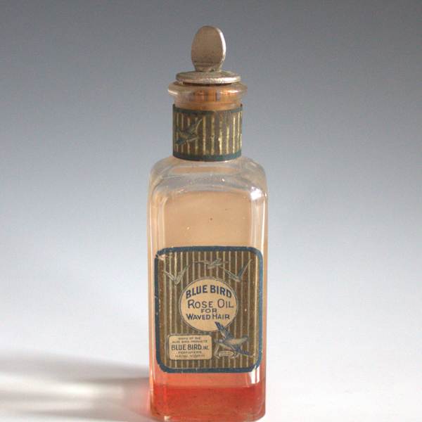 Hair Oil Bottle by Blue Bird, Inc., Image 1.