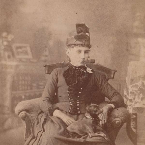 Seated Woman with Dog by Silas B. Brown, Image 1.