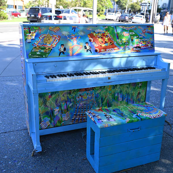 Sit A Spell & Play A Tune - Rotary Plaza by Michael Ives, Image 1.