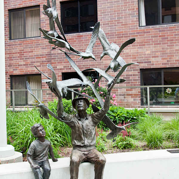 Man and Boy with Birds by Mike Capser, Image 1.