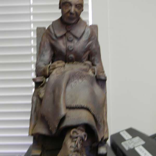 Woman Embroidering by Mary Mashburn, Image 1.