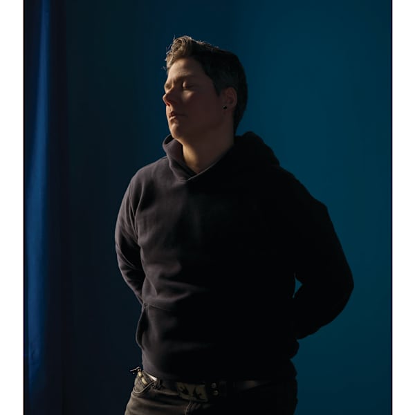 Self-portrait (blue room) by Jess Dugan, Image 1.