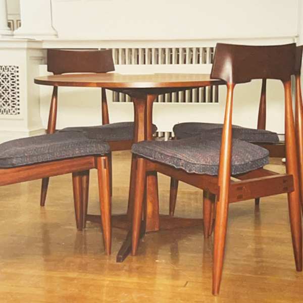 Round Pedestal Table with 4 Stacking chairs by Aaron Rosenstreich, Image 1.