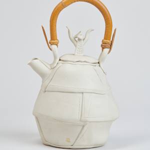 Teapot with Man by Mona Adisa Brooks