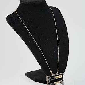 "Abacow" Pendant by Ellen Reiben  Image: Photo credit: Alexis Oltmer