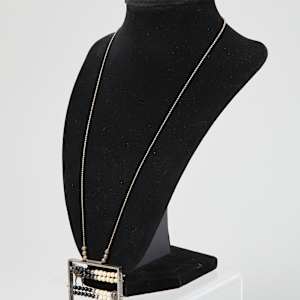 "Abacow" Pendant by Ellen Reiben  Image: Photo credit: Alexis Oltmer