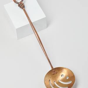Slotted Spoon by Dempsy Calhoun  Image: Photo credit: Alexis Oltmer
