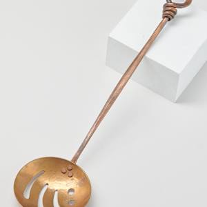 Slotted Spoon by Dempsy Calhoun  Image: Photo credit: Alexis Oltmer