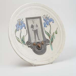 Raku Plate with Photo by Marc Sijan  Image: Photo credit: Alexis Oltmer