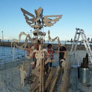 Fire sculpture by Danièle Lamarche-Sarvia neo figurativism, figurative expressionism  painter  Image: 3X5 meters on a metal structure wood with metal joints so it could move with the motion of the fire energy