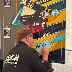 "Senna – Live at Speed" by Artist Allan Buch  Image: Live painting at an exhibition