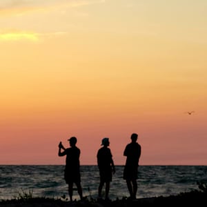 Young Man just flippin' by Tami Hritzay  Image: Three teens