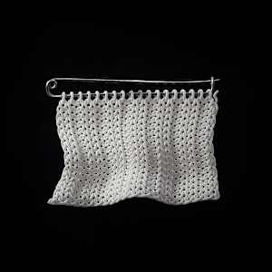 Knitted brooch by Hesti Wade