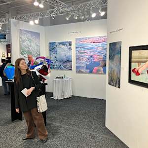 Red Shoes and Red Wine by Sally Ruddy  Image: ArtExpo 2025 crowd observed
