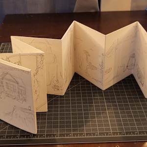 Sam's Neighborhood by Sam Larson  Image: I made this book out of watercolor paper and chip board, in the Leporello accordion book style with a modified cover. When it is finished, it will be painted in watercolor and inked in fine liner.