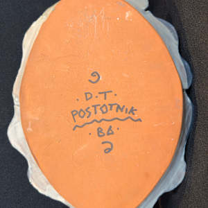 Untitled (platter with side portrait face) by Daniel Postotnik 