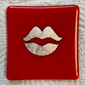 4" red dish with silver foil lips by Julie Root Sawyer, Image 1.