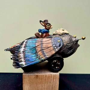 Hare in flight (take off ) by Joanne Robey 