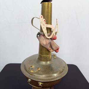 Metal incense burner with face and glasses 