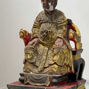 Seated Chinese figure 