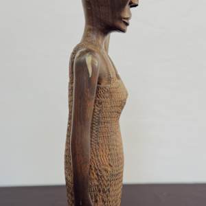 Woman with bundle on her head 