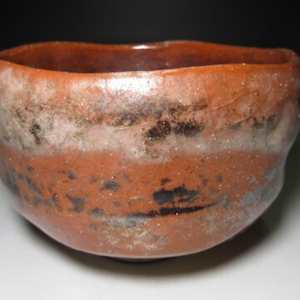 Raku Kichizaemon V, Sonyu 宗入   楽吉左衛門宗入五代 (1664-1716) Red Raku Chawan with Tomobako inscribed by Raku Kichizaemon X, Tannyû (1795-1854) by Raku Kichizaemon V , Sonyu (樂 宗入) 楽吉左衛門 宗入五代 