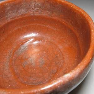 Raku Kichizaemon V, Sonyu 宗入   楽吉左衛門宗入五代 (1664-1716) Red Raku Chawan with Tomobako inscribed by Raku Kichizaemon X, Tannyû (1795-1854) by Raku Kichizaemon V , Sonyu (樂 宗入) 楽吉左衛門 宗入五代 