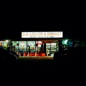 U.S Liquor (obscurity outside the entrance) by Edgardo Cervano-Soto