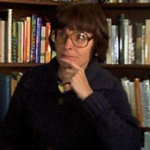 Photographs over the years by Amy Ione  Image: Amy Ione, 2002, surrounded by books.